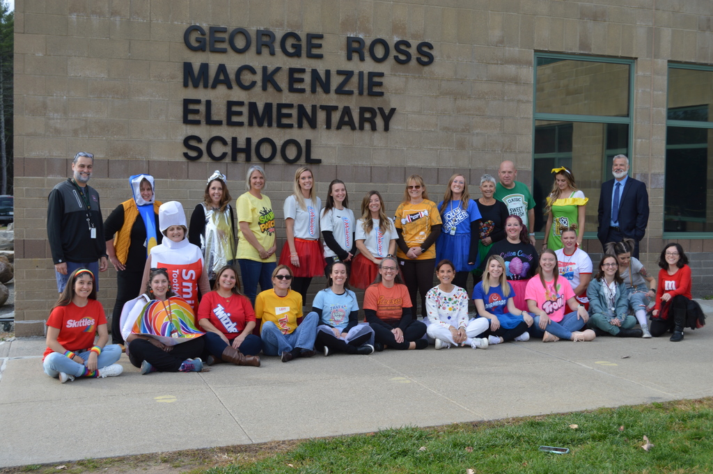 Group picture of faculty and staff in their Halloween costumes.
