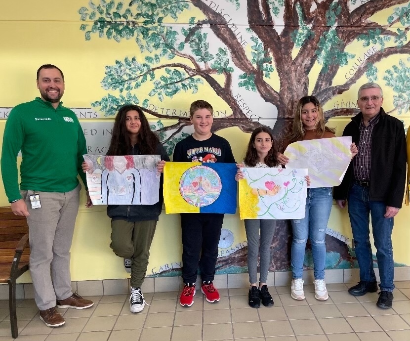 Lions Club Lead with Compassion poster contest winners pictured are Mr. Carpentieri, Building Principal, N. Onorato, A. Koenig, R. Abato, M. Vasquez and Lumberland Lions Vice President, Mr. Jim Bisland
