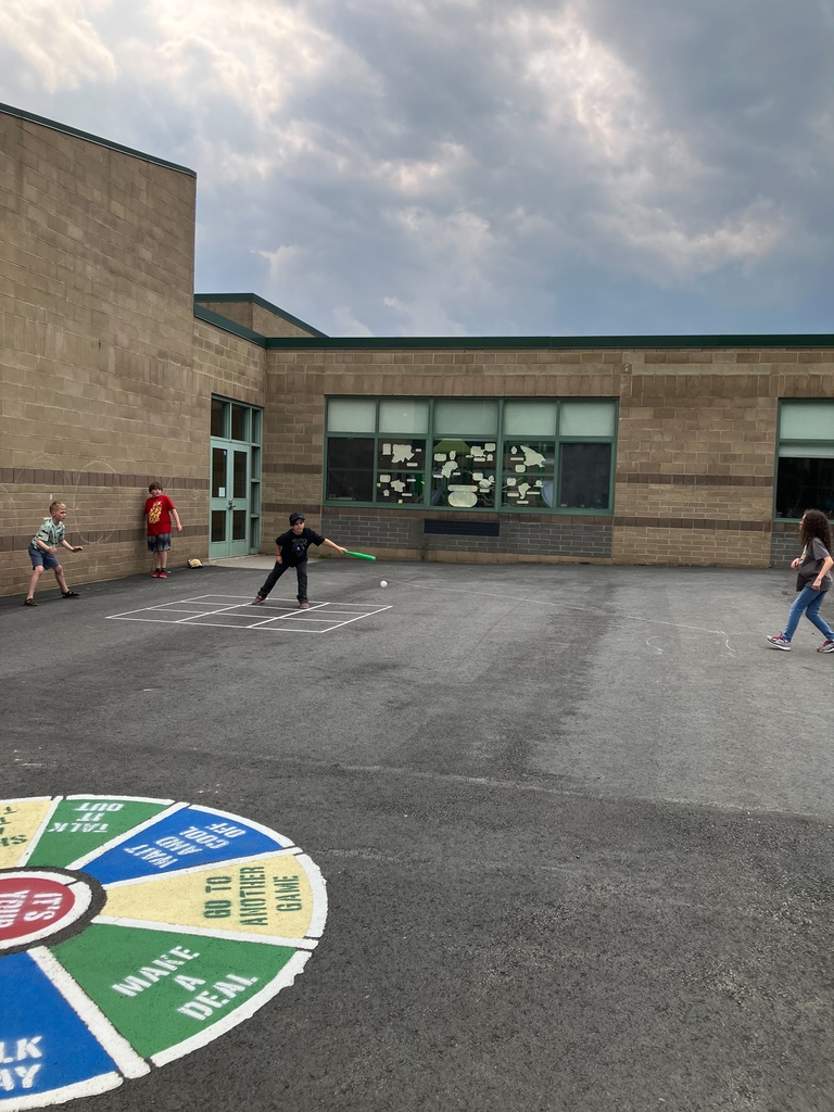 Image of students playing wiffle ball during outdoor club